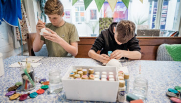 Children painting pottery at Kaz & Annie's Ceramics in Evesham